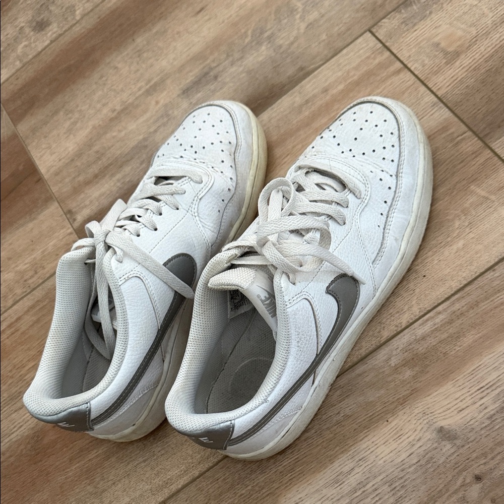 Nike White Low-Top Sneakers with Gray Swoosh and Heel